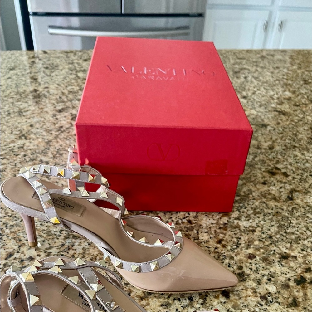 authentic Valentino shoes in a size 8 but run small, fits more like a 7-1/2